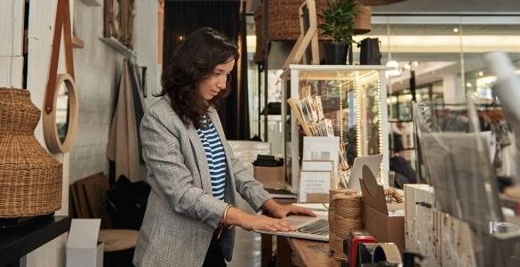 Female entrepreneur working on improving her online business presence