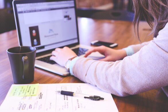 Woman working on laptop computer.