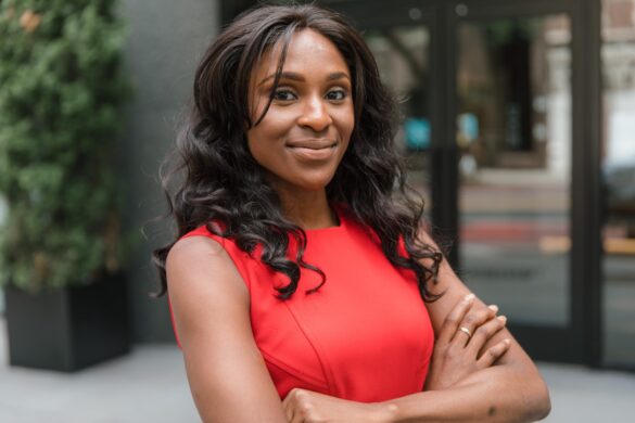 Smiling Black woman in red dress