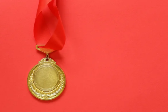Gold Medal with Ribbon.