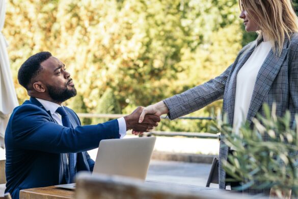 Business black man doing interview to a woman